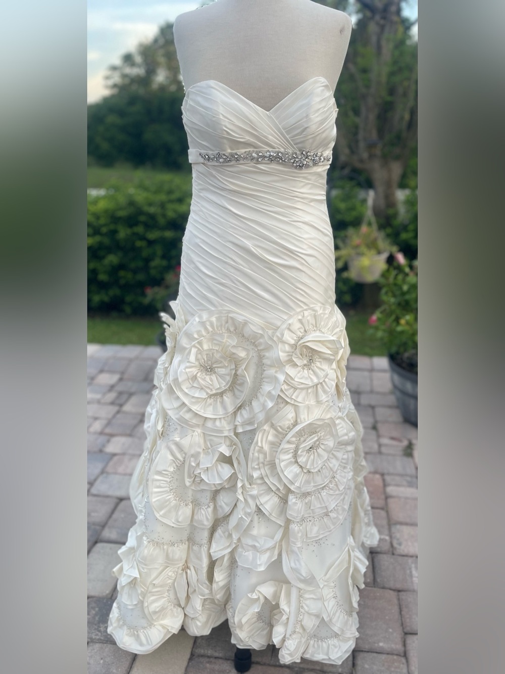Strapless Ivory Bridal Gown with Beaded Waist and Floral Skirt
